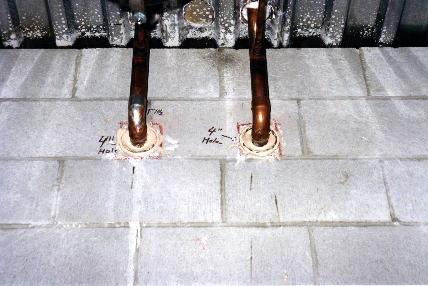 Copper pipe with firestop collars, the kind pulled during a repipe
